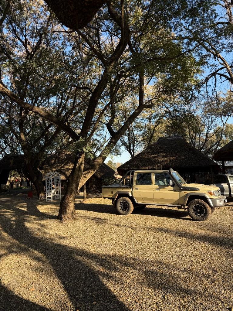 Lodge courtyard with thatched roofs